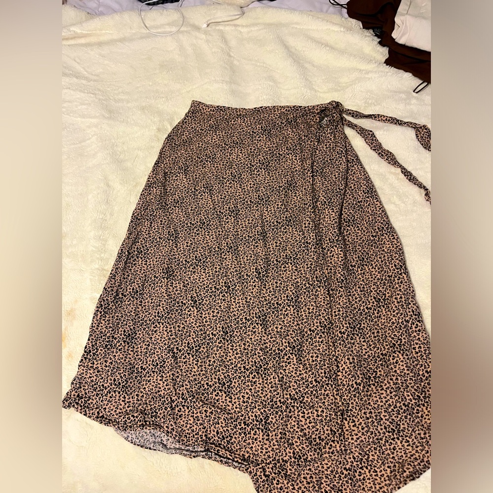 Leopard print flowy, tied skirt,you tie it at your waist and a slip in the front